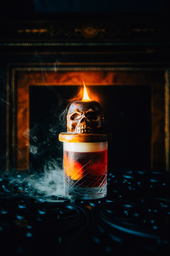 Smoked cocktail served over flame at The Bootlegger Speakeasy