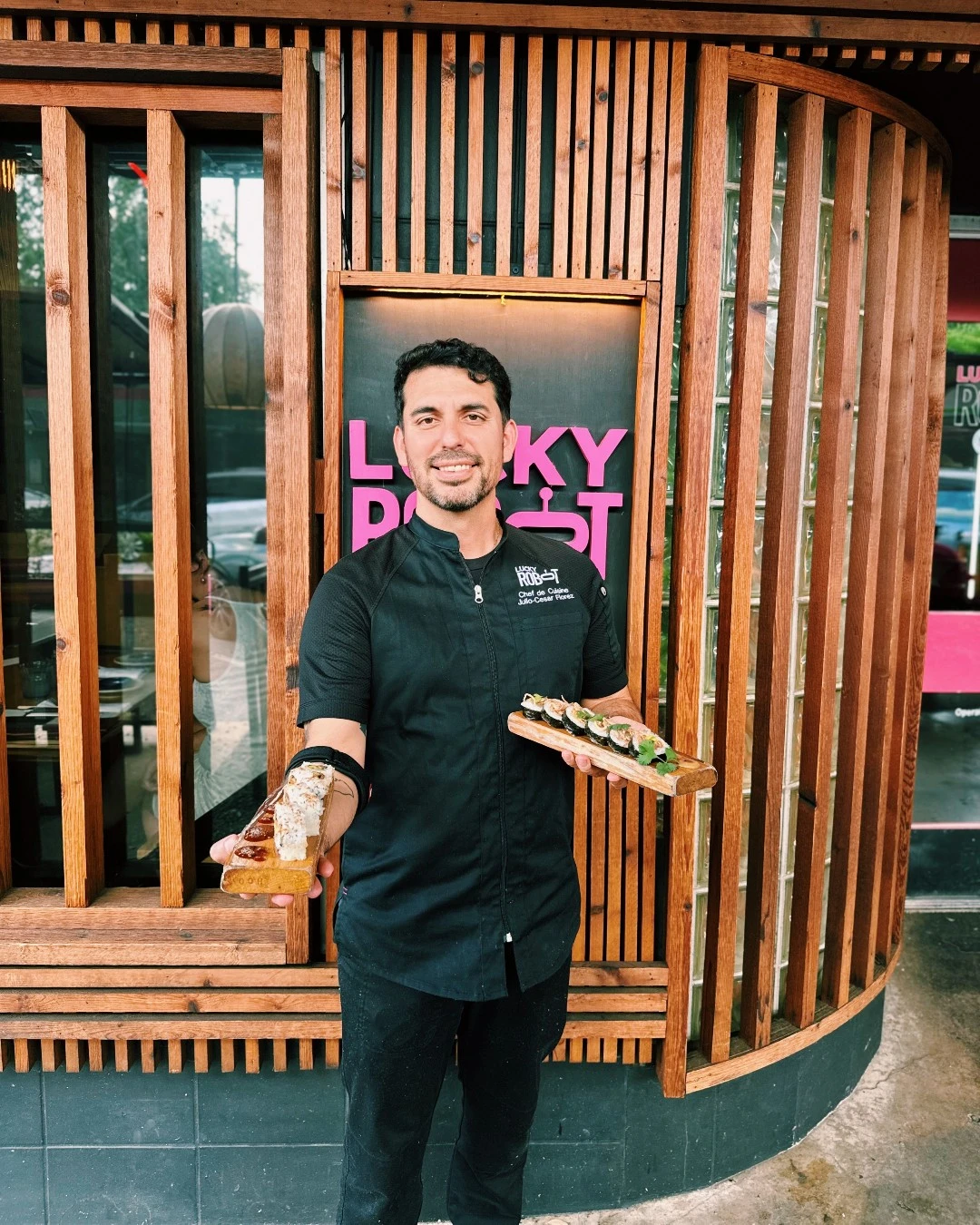 Lucky Robot chef presenting dishes