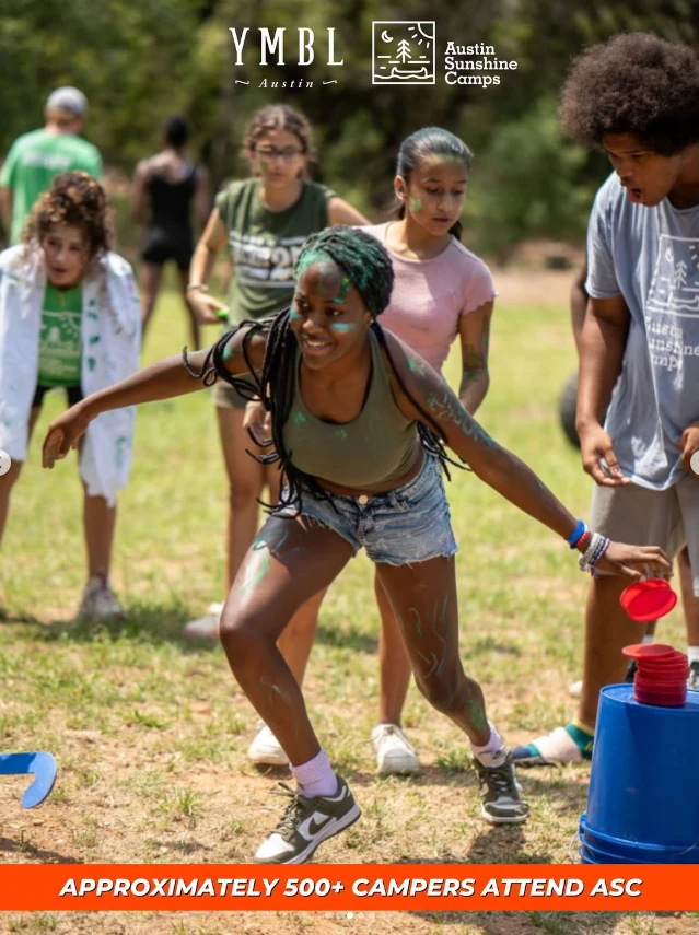 Campers playing outdoor games at Austin Sunshine Camps — approximately 500+ campers attend ASC each year