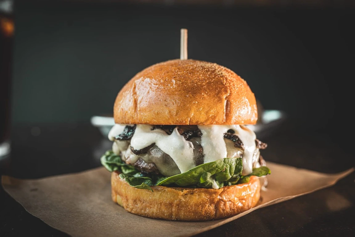 cheeseburger with toppings from the grind burger bar