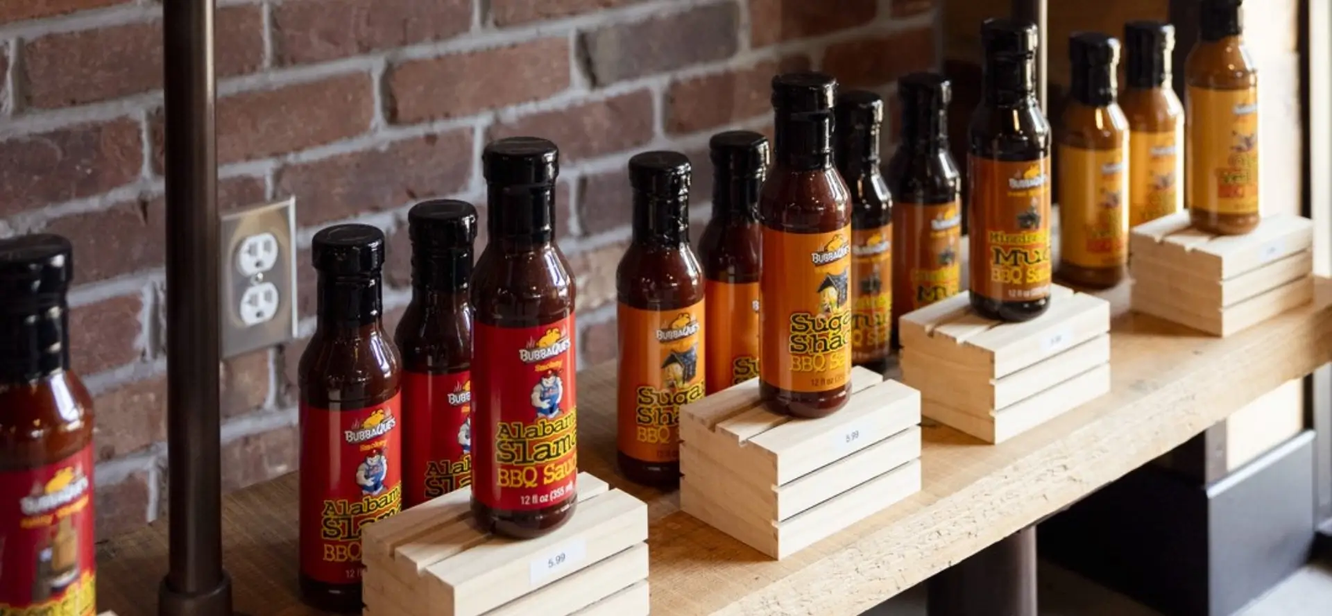 BubbaQue's BBQ sauces on a retail shelf