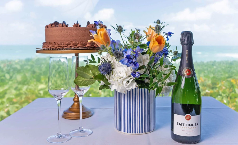Celebration table with champagne and dessert