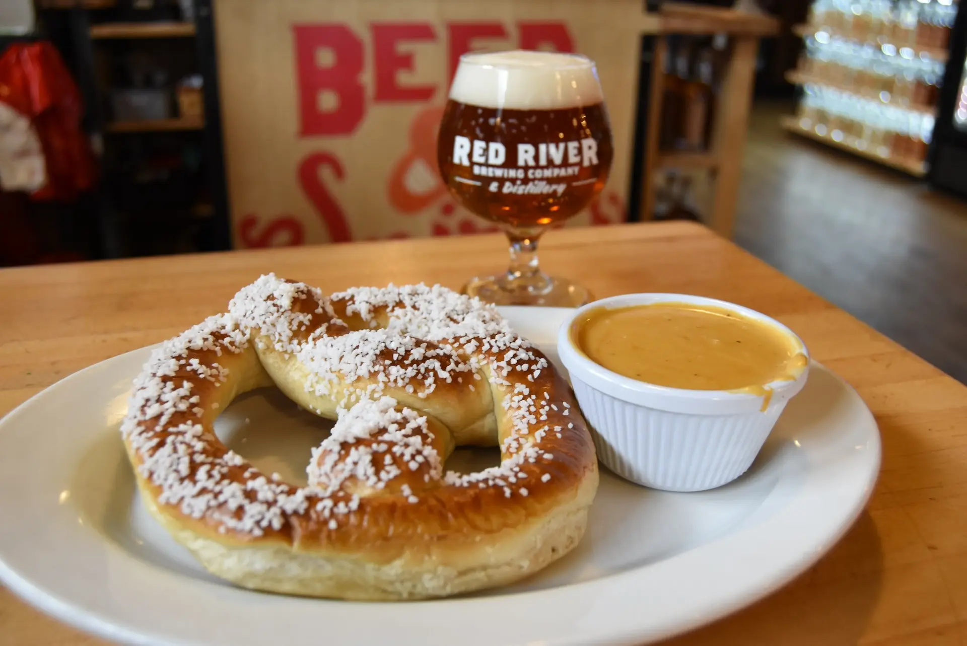 Big pretzel with a glass of beer