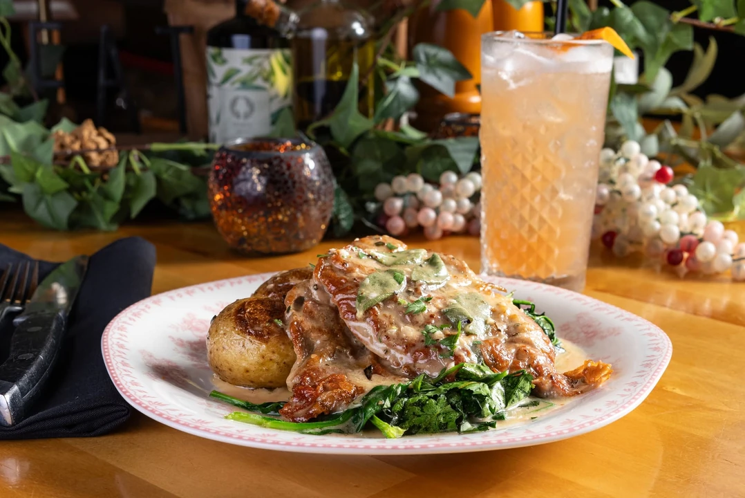 Chicken entree with a cocktail