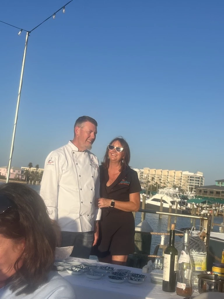 Chef Matt Axtell standing inside THE BOAT BAR restaurant in Port Aransas