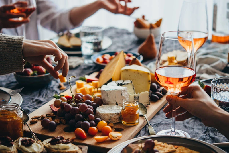 A Ladies Night gathering as guests share a catered spread