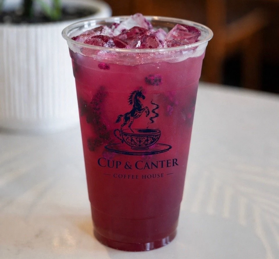 Cup and Canter pink iced canter cooler drink with fruit