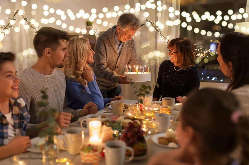 A spouse surprises their partner with an anniversary celebration