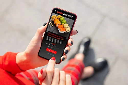 Customer ordering from a restaurant app on a phone