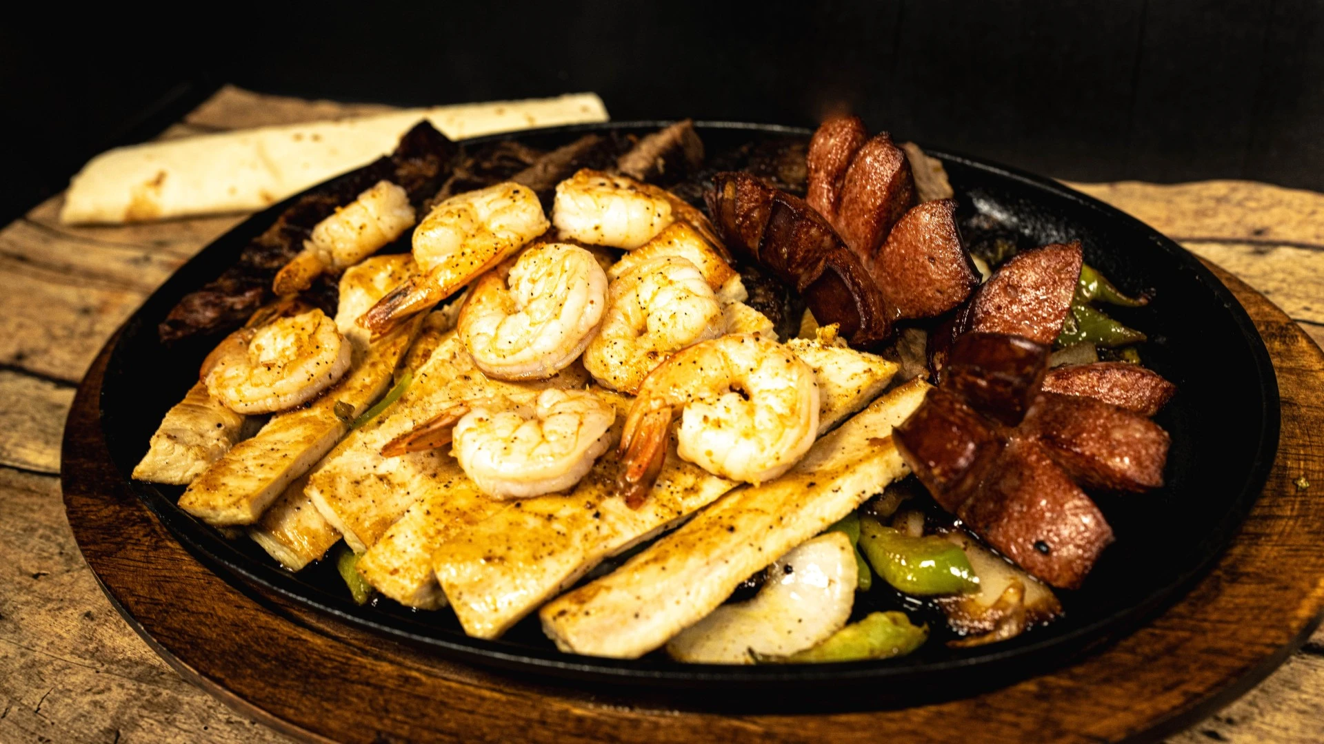 Chicken, Steak, and Shrimp Fajitas