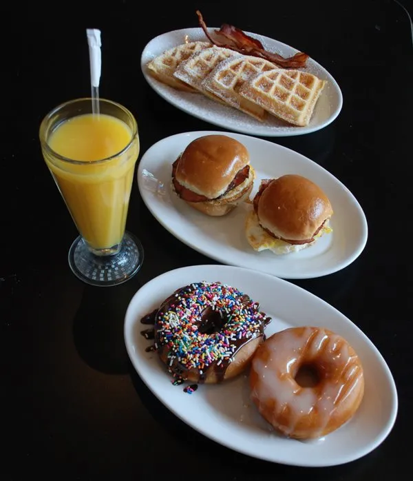 breakfast and brunch meals from hunter's with a drink of orange juice