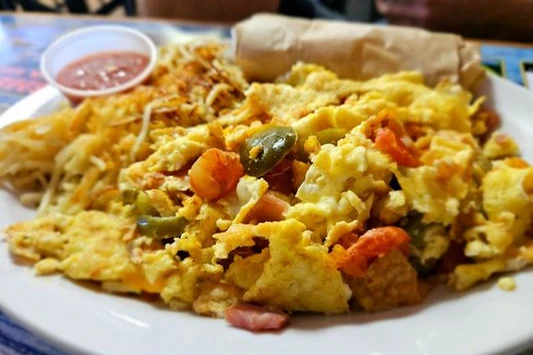 Country skillet breakfast with eggs, peppers and hash browns