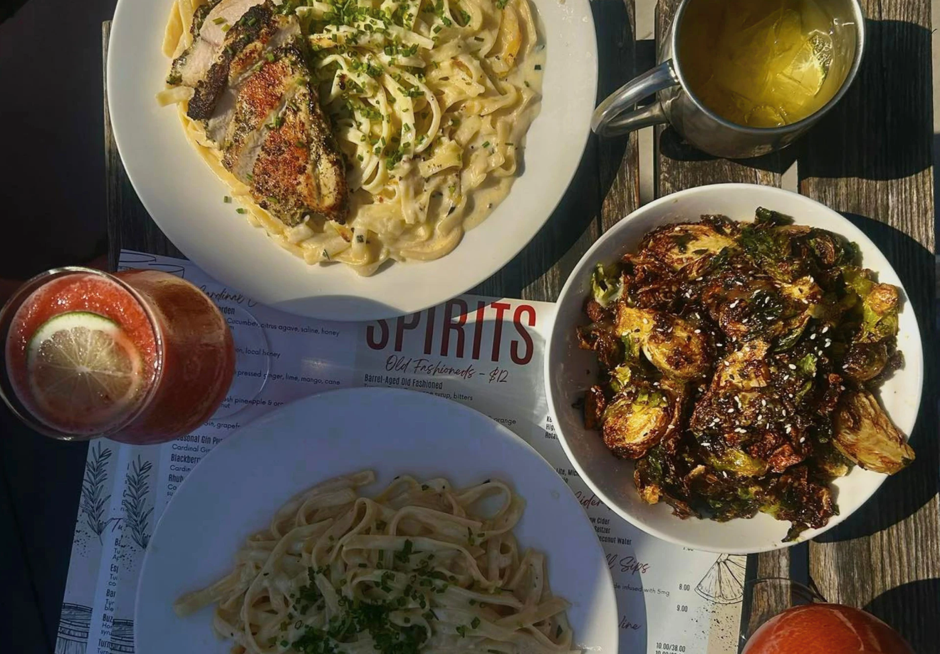 Chicken alfredo, crispy Brussels, and cocktails at Southern Artisan Spirits