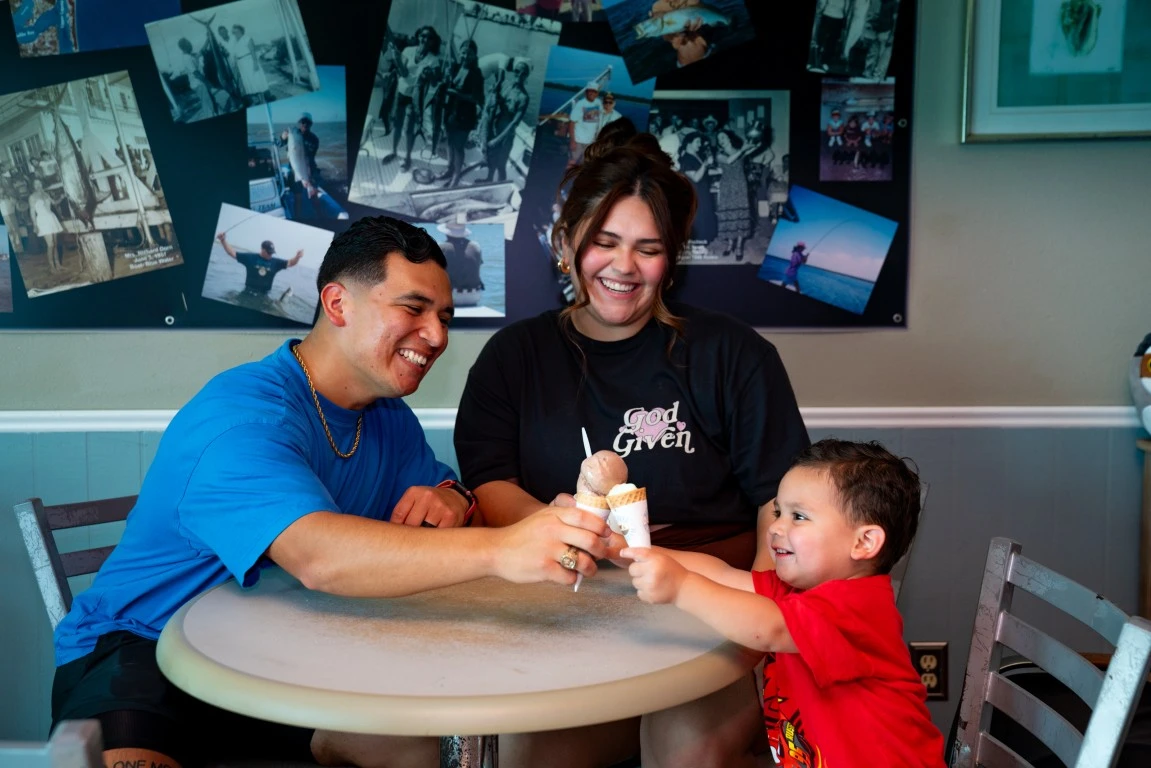 A family enjoying ice cream together at Scoopy's