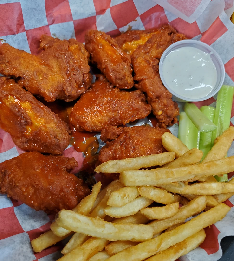 Dipped hot wings and fries